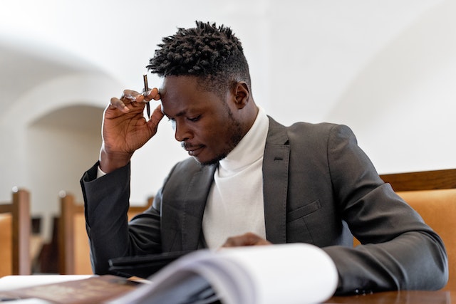 landlord-reading-at-desk